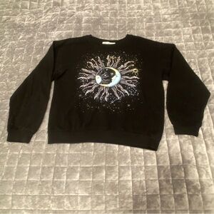 Wound Up Black Sweatshirt with Cosmic Earth Design